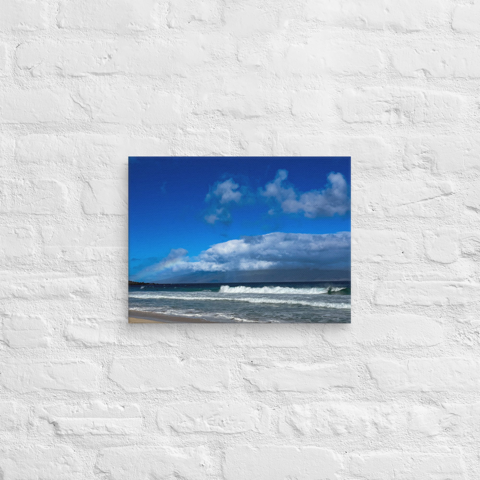Oneloa Beach canvas print — soft rainbow over Lana'i with waves rolling onto Kapalua sand, Hawaii coastal wall art