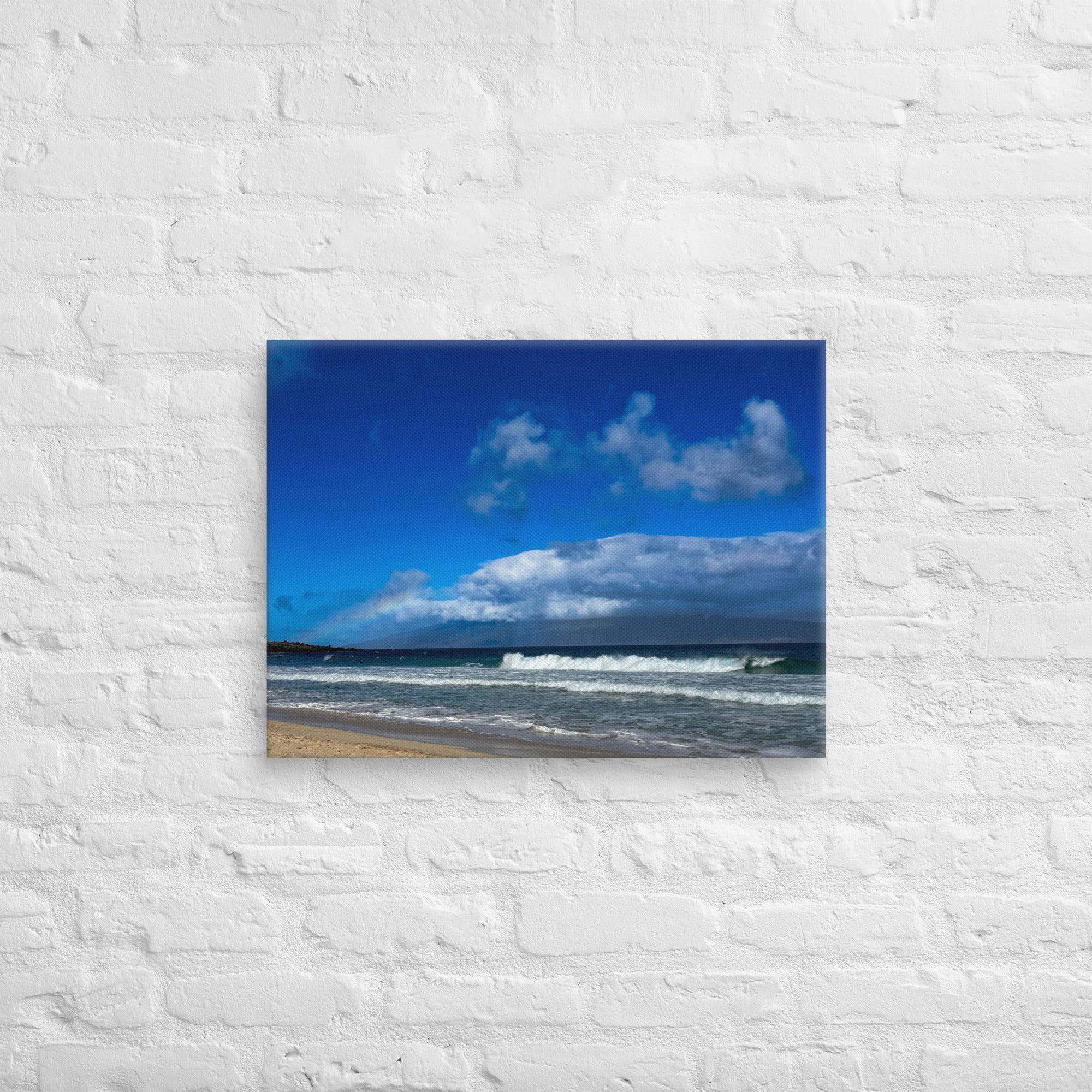 Oneloa Beach canvas print — soft rainbow over Lana'i with waves rolling onto Kapalua sand, Hawaii coastal wall art